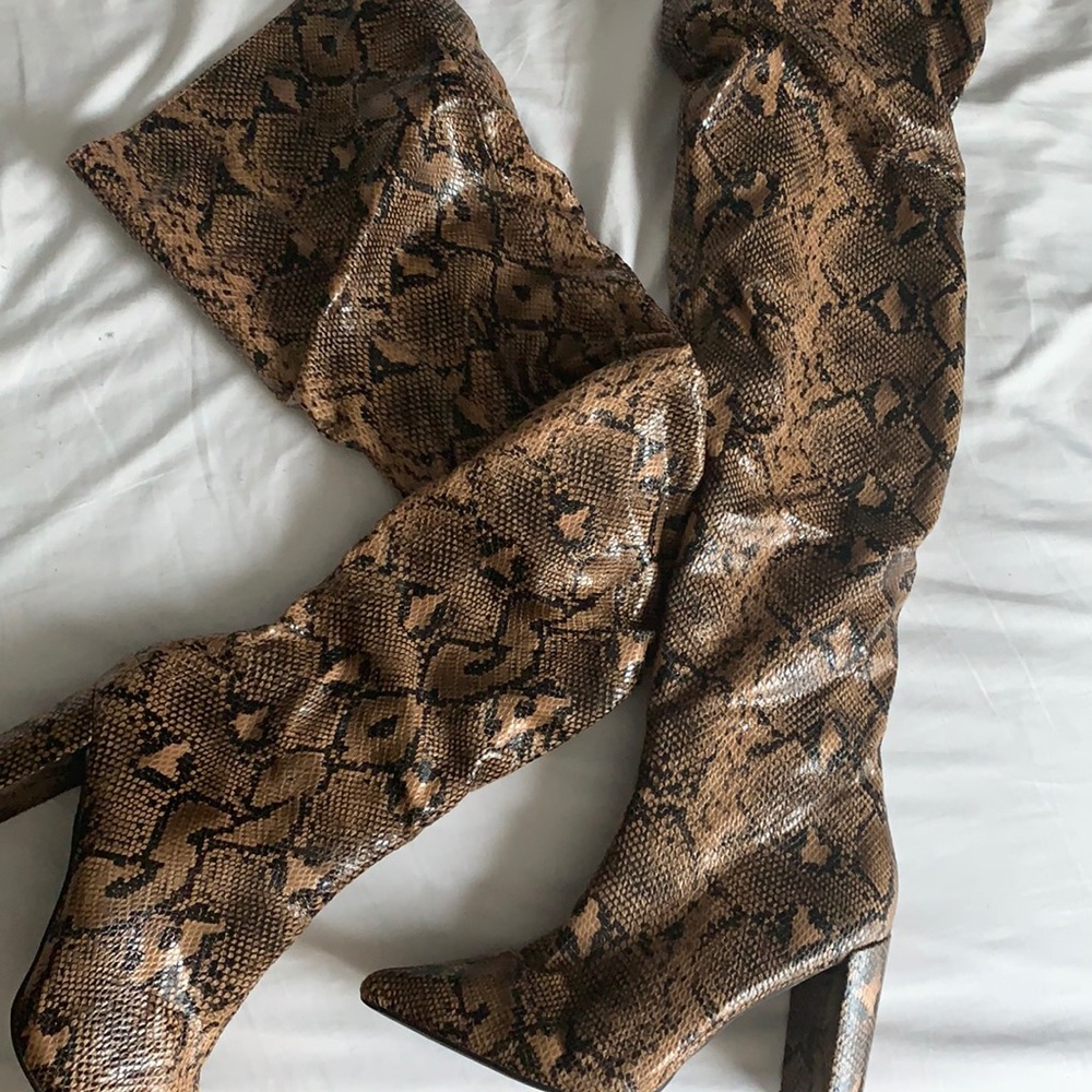 Thigh high snake skin boots
